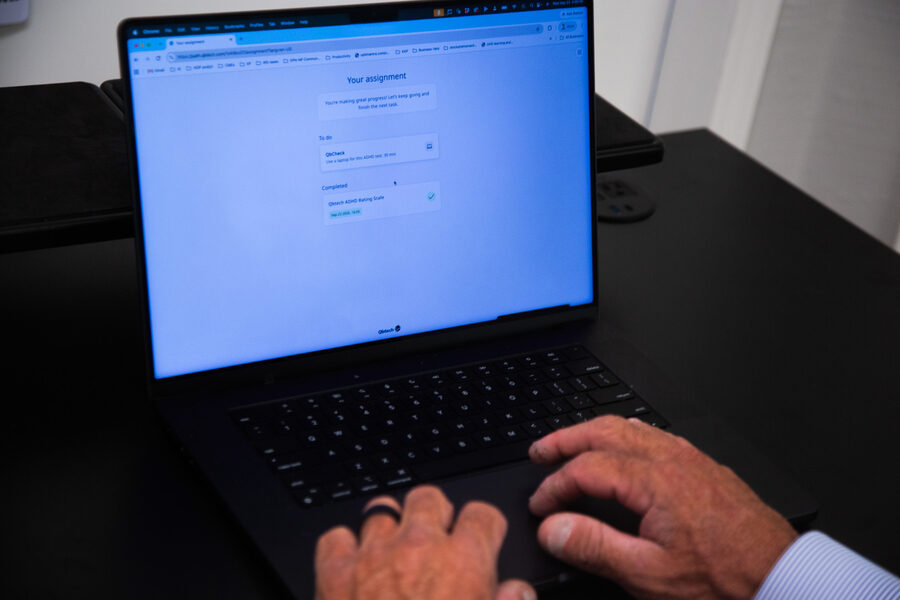 A QbCheck attention test on a laptop